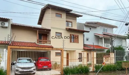 Casa com 3 quartos à venda na Rua Luiz Delfino, 109, Espírito Santo, Porto Alegre por R$ 850.000