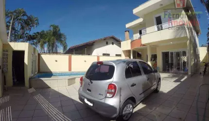 Sobrado com piscina  4 dormitórios à venda, 165 m² por R$ 1.500.000  Solemar  Praia Grande SP