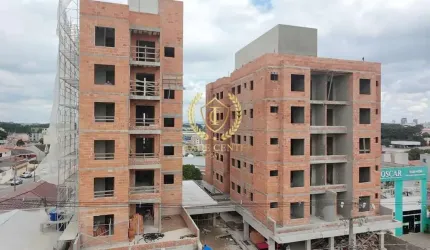 APARTAMENTO COM 2 QUARTOS SENDO 1 SUÍTE + 2 VAGAS.