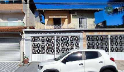 Sobrado com 3 dormitórios à venda, 118 m² por R$ 680.000,00 - Canto do Forte - Praia Grande/SP