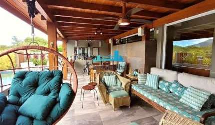 Casa em condomínio fechado com 5 quartos à venda no Cacupé, Florianópolis  por R$ 4.800.000