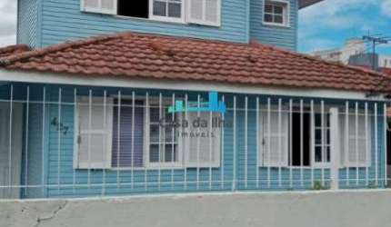 Casa com 4 quartos à venda na Praia Comprida, São José  por R$ 900.000