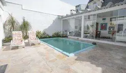Casa com 3 quartos à venda na Rua Gustavo Schmidt, 592, Três Figueiras, Porto Alegre por R$ 1.990.000