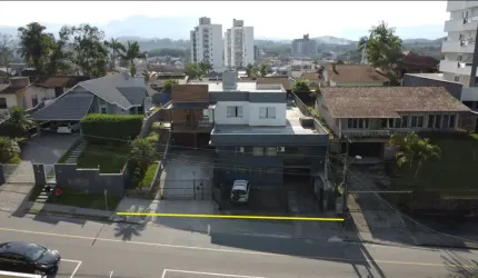Terreno com casa e galpão Comercial Costa e Silva Joinville.