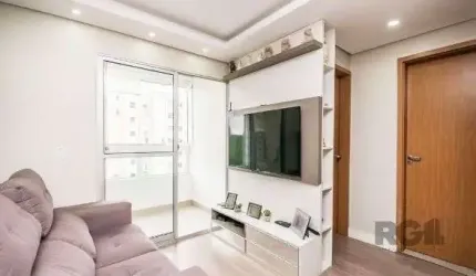Apartamento com 2 quartos, sala, cozinha, sacada com churrasqueira e 1 vaga.