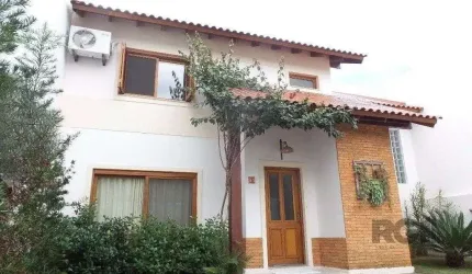 Excelente casa em condomínio com 3 dormitórios e 4 vagas.