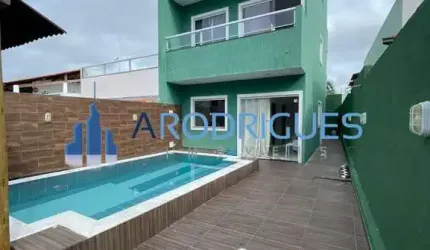 Casa de luxo em condomínio à venda em Jauá (Abrantes), Camaçari-BA: 3 quartos, 2 suítes, 135m², 2 vagas.