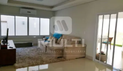 Casa em condomínio fechado com 3 quartos para alugar no Jardins Gênova, Uberlândia  por R$ 18.000