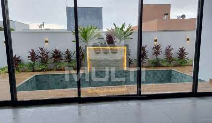 Casa em condomínio fechado com 4 quartos à venda no Jardins Gênova, Uberlândia  por R$ 2.800.000