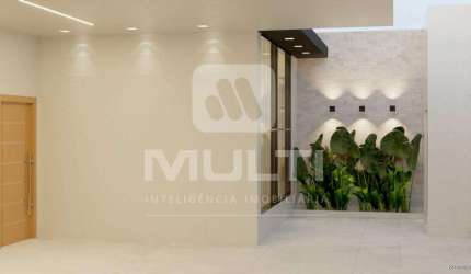 Casa com 3 quartos à venda no Jardim Auroras, Uberlândia  por R$ 830.000