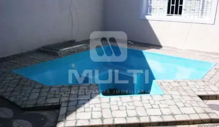 Casa com 4 quartos à venda no Marta Helena, Uberlândia  por R$ 850.000
