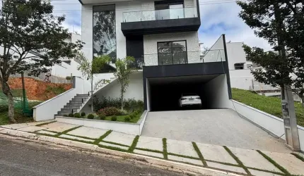 MARAVILHOSO sobrado no Condomínio MOSAICO DA SERRA 324 m² com 4 suítes espaço gourmet e piscina