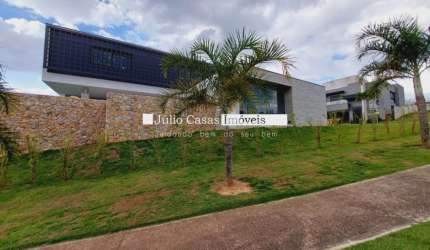 Casa em condomínio a venda com 4 suítes