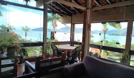 Casa para venda em Praia Da Enseada de 291.00m² com 4 Quartos, 2 Suites e 6 Garagens