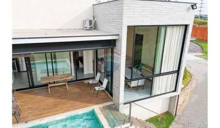 Casa de Condomínio para venda em Iporanga de 410.00m² com 4 Quartos, 4 Suites e 6 Garagens