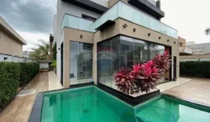 Casa de Condomínio para alugar em Residencial E Empresarial Alphaville de 380.00m² com 5 Quartos, 5 Suites e 4 Garagens