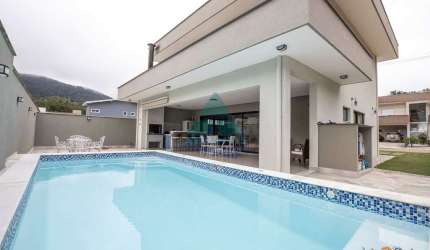 Casa para venda em Condominio Capitanias de 205.00m² com 4 Quartos, 4 Suites e 3 Garagens