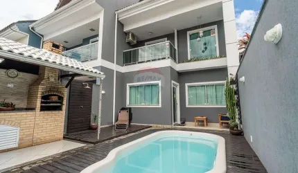 Casa de Condomínio para venda em Taquara de 136.00m² com 3 Quartos, 1 Suite e 1 Garagem