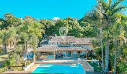 Casa para venda em Capela Do Barreiro de 480.00m² com 5 Quartos, 3 Suites e 6 Garagens