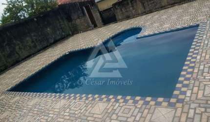 Casa para venda em Itanhaém de 386.00m² com 3 Quartos e 2 Garagens