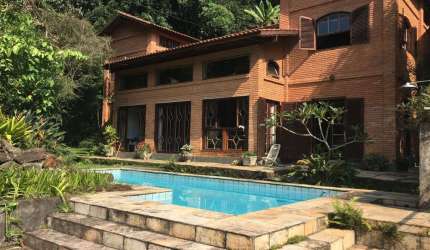 Casa de Condomínio para alugar em Caraguatá de 350.00m² com 4 Quartos e 6 Garagens