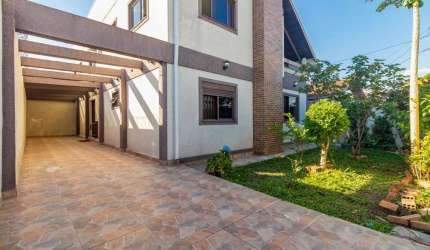 Casa com 5 dormitórios para alugar, 220 m² por R$ 5.819,11/mês - Uberaba - Curitiba/PR