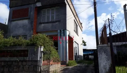 Casa com 3 quartos à venda na Rua Caldre e Fião, 524, Santo Antônio, Porto Alegre por R$ 580.000