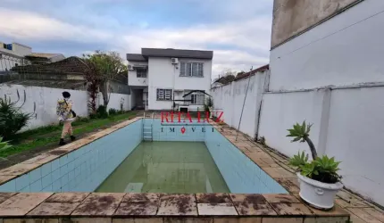 Casa em condomínio fechado com 3 quartos à venda na Rua Campos Elíseos, 85, Glória, Porto Alegre por R$ 680.000
