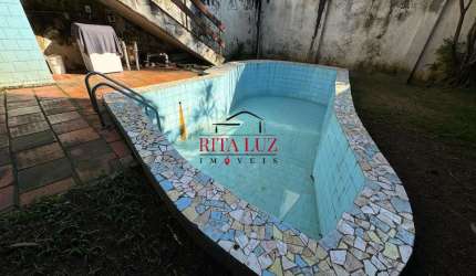 Casa com 4 quartos à venda na Rua Silva Só, 147, Santa Cecília, Porto Alegre por R$ 920.000