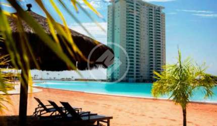 Apartamento condominio Brasil Beach de 88m2 com dois quartos sendo uma suíte, sacada com chiurrasqueira, banheiro social, lavabo, móveis planejados, duas vagas de garagem, depósito, área de lazer comp