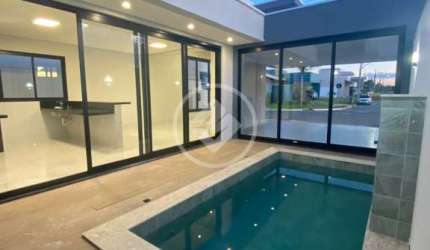 CASA EM CONDOMINIO FECHADO NO PRIMOR DAS TORRES COM 3 SUÍTES PISCINA COM CASCATA COZINHA GOURMET COM CHURRASQUEIRA codigo: 105149