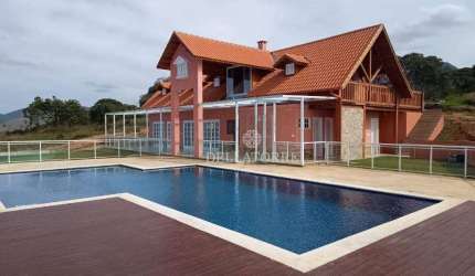Terreno à venda, 702 m² por R$ 110.000,00 - Pessegueiros - Teresópolis/RJ