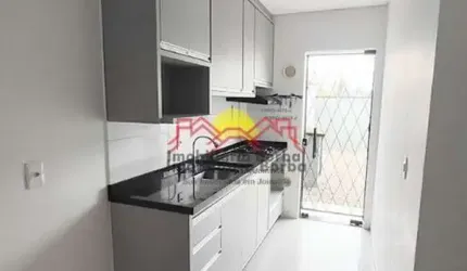 Sobrado Geminado com 02 Vagas de Garagem