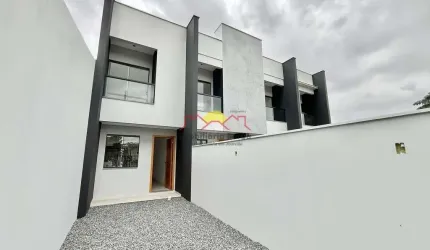 Sobrado Geminado com 02 Vagas de Garagem