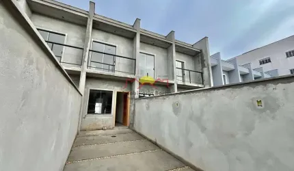 Sobrado Geminado com 02 Vagas de Garagem