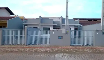 Geminado Térreo com 71m2 e espaço aos fundos sendo 1 suíte + 1 quarto