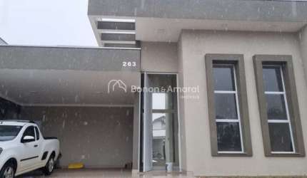 Casa à venda em condomínio, em Paulínia, 3 suites, closet, lavabo, escritório, 4 vagas, aquecimento solar, piscina com cascata,fino acabamento.