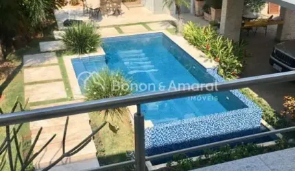 Casa de condomínio com 520 m² e 4 suítes