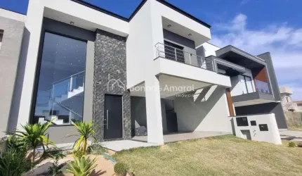 Casa em condomínio à venda, com 4 suítes (1 térrea), 198 m² de área construída