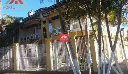 Casa com 4 dormitórios à venda, 372 m² por R$ 1.800.000,00 - Jardim Planalto - Porto Alegre/RS
