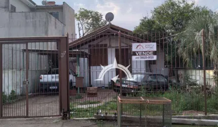 Excelente terreno 10x54 m com casa mista á venda na Protásio Alves