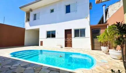 Casa com piscina,  6 dormitórios à venda, 290 m² por R$ 950.000 - Cohapar - Guaratuba/PR
