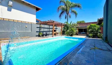 Casa com 4 dormitórios à venda, 142 m² por R$ 750.000,00 - Brejatuba - Guaratuba/PR