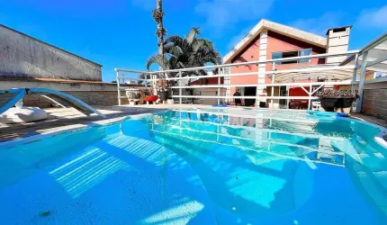 Casa com 4 dormitórios à venda, 300 m² por R$ 1.400.000,00 - Centro - Guaratuba/PR