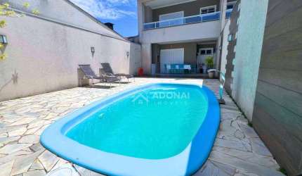 Sobrado com 3 dormitórios à venda, 159 m² por R$ 795.000,00 - Nereidas - Guaratuba/PR