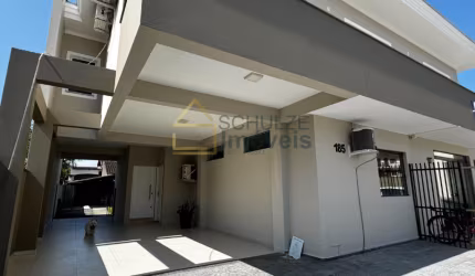 Excelente sobrado residencial e comercial localizado no Bairro Saguaçu