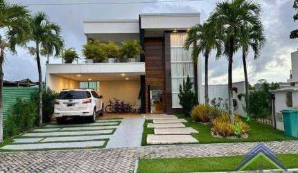 Casa com 4 dormitórios à venda, 238 m² por R$ 1.600.000,00 - Cidade Alpha - Eusébio/CE