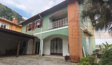 Oportunidade única: Casa à venda no Parque Assunção, Taboão da Serra-SP, com 3 quartos, suíte e 6 vagas de garagem!