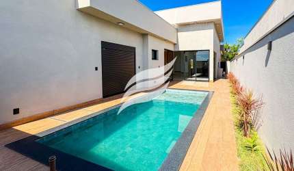 Casa em obra cinza no Condomínio Alphaville 2