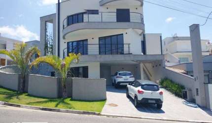 Sobrado de Alto Padrão com piscina, sauna, cascata, 04 suítes e 6 vagas  à venda, 336 m² por R$ 3.150.000 - Residencial Real Park - Arujá/SP